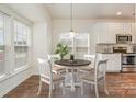 Bright kitchen with stainless steel appliances and white cabinets at 105 Beverly Chase Ln, Mooresville, NC 28117