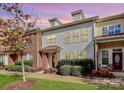 Two story townhome with brick and siding exterior at 2030 Cambridge Beltway Dr, Charlotte, NC 28273