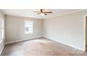 Bright bedroom with a ceiling fan, window and carpeted floor at 2209 Dale Ave, Lincolnton, NC 28092