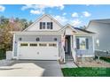 Charming two-story home with a well-manicured lawn and inviting entrance at 25622 Seagull Dr # 645, Lancaster, SC 29720
