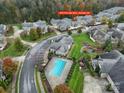 Aerial view showing home, pool, and community at 4919 Polo Gate Blvd, Charlotte, NC 28216