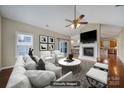 Spacious living room with fireplace and hardwood floors at 4919 Polo Gate Blvd, Charlotte, NC 28216