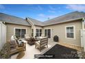 Relaxing patio with seating area, perfect for outdoor entertaining at 4919 Polo Gate Blvd, Charlotte, NC 28216