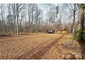 Wooded lot with small cabin and covered shelter at 1895 Forest Lake Dr, Rock Hill, SC 29732