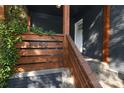 Inviting front porch with wooden railing and decorative address display at 3452 Airlie St, Charlotte, NC 28205