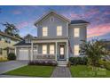 Two-story house with gray siding, white trim, and a charming front porch at 440 Luray Way, Rock Hill, SC 29730