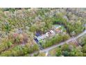 Birds-eye view shows the layout of the property, highlighting the home's location and landscaping at 2164 Mission Rd, York, SC 29745