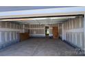 Unfinished two-car garage with concrete floor and drywall at 2387 Trundle Dr # Cwo0155, Gastonia, NC 28054