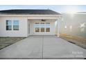 Covered patio with ceiling fan, ideal for outdoor relaxation at 3118 Whispering Creek Dr # 188, Indian Trail, NC 28079