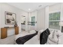 Well-lit bedroom with ensuite bathroom access and modern decor at 1000 Fairground St, Charlotte, NC 28208