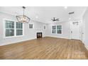 Bright living room with hardwood floors, fireplace, and high ceilings at 1000 Fairground St, Charlotte, NC 28208