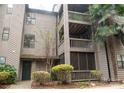 Building exterior showcasing multiple balconies and landscaping at 4130 Charlotte Hwy # G, Lake Wylie, SC 29710