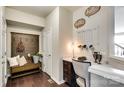 Stylish entryway with a built-in bench, desk, and decorative wall accents at 1068 Kinship Dr # 111, Lancaster, SC 29720