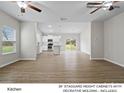Open concept living space with a kitchen featuring stainless steel appliances at 204 Lake George Dr, Shelby, NC 28152