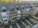 Aerial view of townhomes with rooftop decks, showcasing the community layout and design at 544 Billingsley Rd, Charlotte, NC 28211