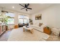 Bright living room featuring large windows, neutral tones, and stylish decor at 544 Billingsley Rd, Charlotte, NC 28211