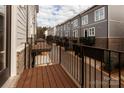 View from balcony overlooking townhouses and parking at 2212 Noble Townes Way, Charlotte, NC 28262