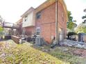 Brick house with a deck and backyard at 6308 E Lake Forest E Rd # 2, Charlotte, NC 28227