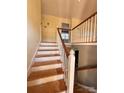 Interior view of a staircase with wooden steps at 6308 E Lake Forest E Rd # 2, Charlotte, NC 28227