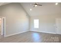 Spacious living room with vaulted ceiling and vinyl plank flooring at 310 Genell Ln, Rock Hill, SC 29730