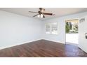 Inviting living room with hardwood flooring, ceiling fan, and a bright window at 1106 Chandler Dr, Rock Hill, SC 29732