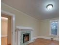 Fireplace with tiled surround in a bright room at 126 E Division Ave, Salisbury, NC 28144