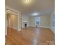 Bright living room with hardwood floors and fireplace at 126 E Division Ave, Salisbury, NC 28144