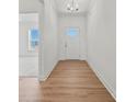 Bright foyer with wood flooring, leading into the home's living spaces at 1074 Kinship Dr # 110, Lancaster, SC 29720