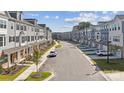Aerial view of townhome community showcasing street and building exteriors at 7112 Brookview Ln, Sherrills Ford, NC 28673