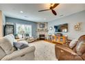Spacious living room featuring a fireplace and ample seating at 1035 Crescent Moon Dr, Fort Mill, SC 29715