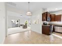 Open-concept kitchen adjacent to the living room with ample counter space and modern finishes at 14423 Glendon Hall Ln, Charlotte, NC 28262