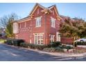 Brick townhome exterior showcasing architectural details at 884 Park Slope Dr, Charlotte, NC 28209