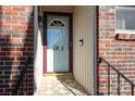 Front door entry with brick and tile flooring at 2701 Palm Ave, Charlotte, NC 28205