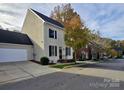 Two story home with attached garage and driveway at 548 Summerfield Pl, Belmont, NC 28012