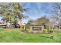 Keswick community entrance sign with landscaping and trees at 5635 Ballinard Ln, Charlotte, NC 28277