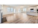 Open living space with hardwood floors and kitchen island at 4481 Doyle Ridge Rd, Maiden, NC 28650