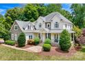 Stunning two-story home with stone accents and a welcoming front porch at 9267 Egret Rdg # 41, Belmont, NC 28012