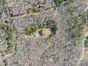 Secluded home nestled amongst wooded acres offering ultimate privacy and serenity at 6610 Rolling Ridge Dr, Waxhaw, NC 28173