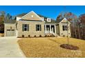Beautiful brick home with attached garage, well-kept lawn and professional landscaping at 3850 Willow Grove Ln # 24, Concord, NC 28025
