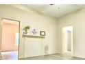 Open living area with hardwood floors and a fireplace at 606 Carver St, Kannapolis, NC 28083