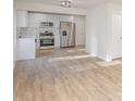 Modern kitchen with white shaker cabinets, stainless steel appliances, and quartz countertops at 429 Dare Dr, Charlotte, NC 28206