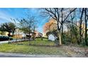 Backyard with shed and partially fenced area at 5745 Southampton Rd, Charlotte, NC 28217