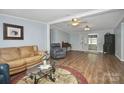 Inviting living room boasting hardwood floors and neutral color scheme at 335 Ridgewood Dr, Mt Ulla, NC 28125