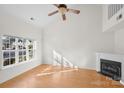 Bright living room with hardwood floors and a fireplace at 14922 Deshler Ct, Charlotte, NC 28273