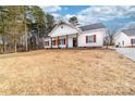 Beautiful single-story home with dark roof, complemented by white siding and a large front yard at 1300 Eddie St, Gastonia, NC 28054