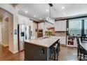 Well-equipped kitchen with granite island, stainless steel appliances, and ample white cabinetry at 6012 Drave Ln, Fort Mill, SC 29715