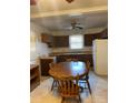 Cozy kitchen area with wooden cabinets and a large table, perfect for Gathering meals at 805 Railroad Ave, China Grove, NC 28023