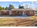 Brick ranch house with a gravel driveway at 2930 W Innes St, Salisbury, NC 28144