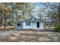 Newly renovated house with gray siding and white accents at 129 Doster Rd, Lancaster, SC 29720