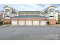 A detached multi-car garage provides ample parking and storage at 8931 Meadow Vista Rd, Charlotte, NC 28213